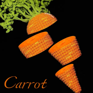 Finished crochet carrot amigurumi with leafy green top on a dark background