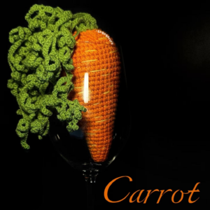 Round-by-round crochet carrot body pattern chart and finished carrot example