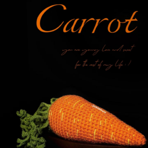 Finished crochet carrot amigurumi with leafy green top on a dark background